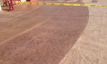 concrete micro toppings outside of a commercial business; shopping center flooring