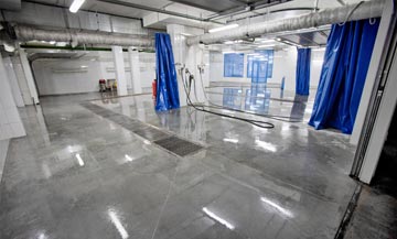 Polished concrete in a hand detailing car wash building