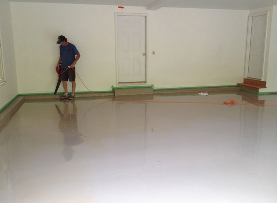 tan epoxy flooring in a residential garage