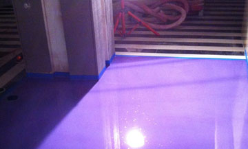 purple shiny (pearlescent) epoxy flooring in residential home
