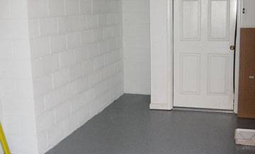gray epoxy flooring in garage of residential house