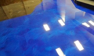 vivid blue epoxy flooring in a commercial space